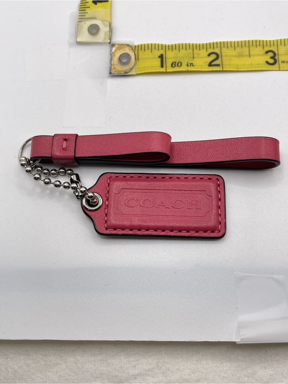 Coach Fuchsia Leather Hang Tag with Tassel